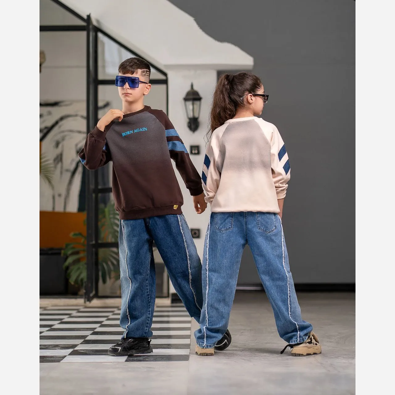 ست بلوز و شلوار جین مدل شافل بگ مناسب 7 تا 14 سال با رنگهای کرم و آبی روشن و قهوهای