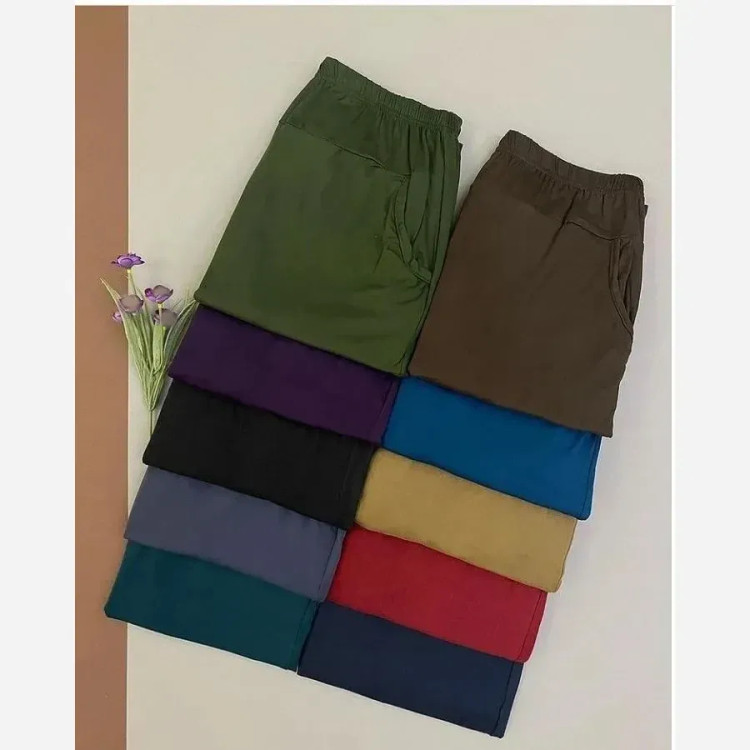 شلوار راحتی زنانه اسلش طرح گیاهی وارداتی قواره آزاد مچ دار سایز بزرگ (2)
