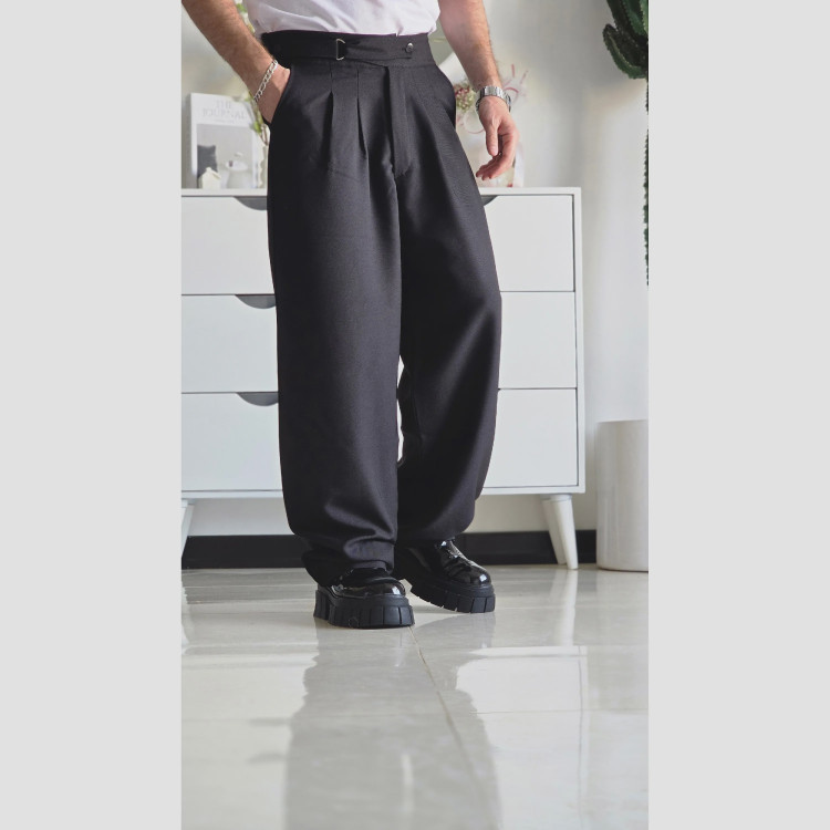 شلوار بگ پارچه ای کجراه مشکی کمر ایتالیایی پیله دار زنانه سایز L تا 3XL