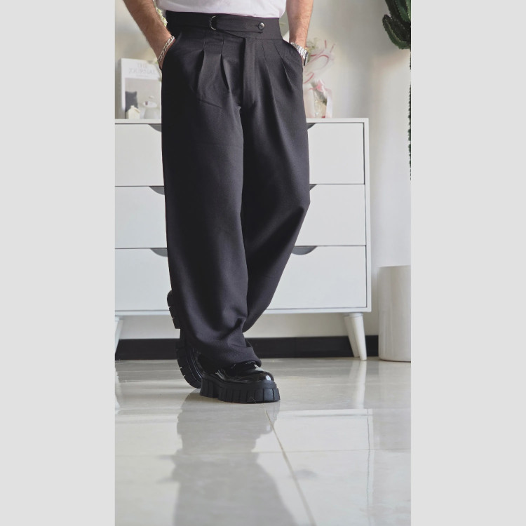شلوار بگ پارچه ای کجراه مشکی کمر ایتالیایی پیله دار زنانه سایز L تا 3XL