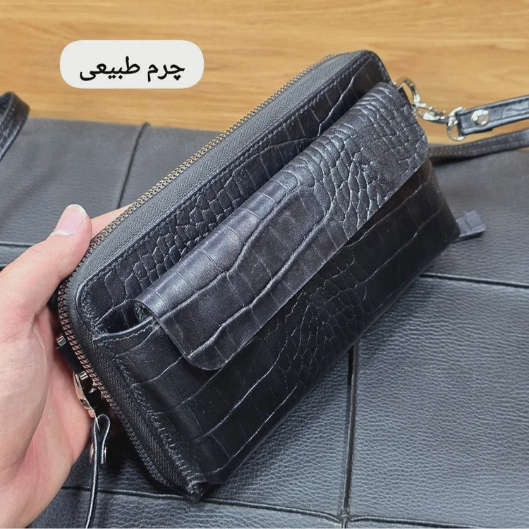 کیف دستی و دوشی چرم طبیعی ظفر دارای بند مچی و بند بلند قابل تنظیم