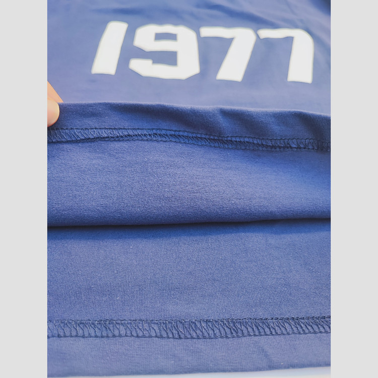ست تیشرت و شلوارک اسپرت پسرانه و دخترانه طرح 1977 رنگ سرمه ای سایز 55 تا 75