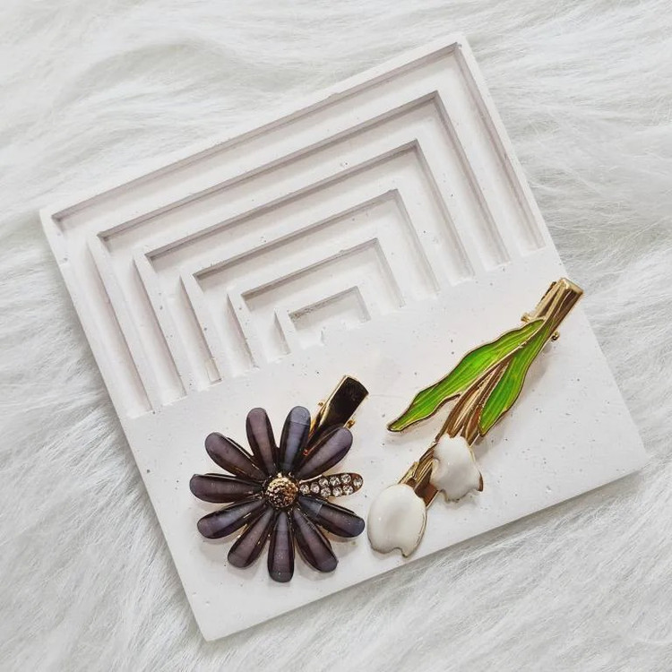 گیره مو وارداتی طرح بابونه و لاله بسته 2 عددی