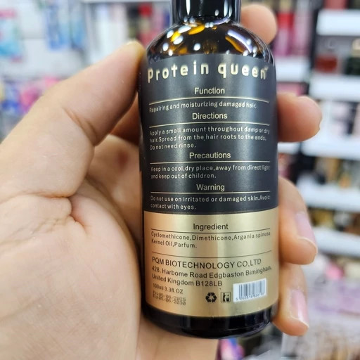 سرم روغن آرگان پروتئین کووین مدل کراتین و پروتئین مغذی ترمیم کننده و ضد موخوره 100 میلیلیتر فاقد چربی