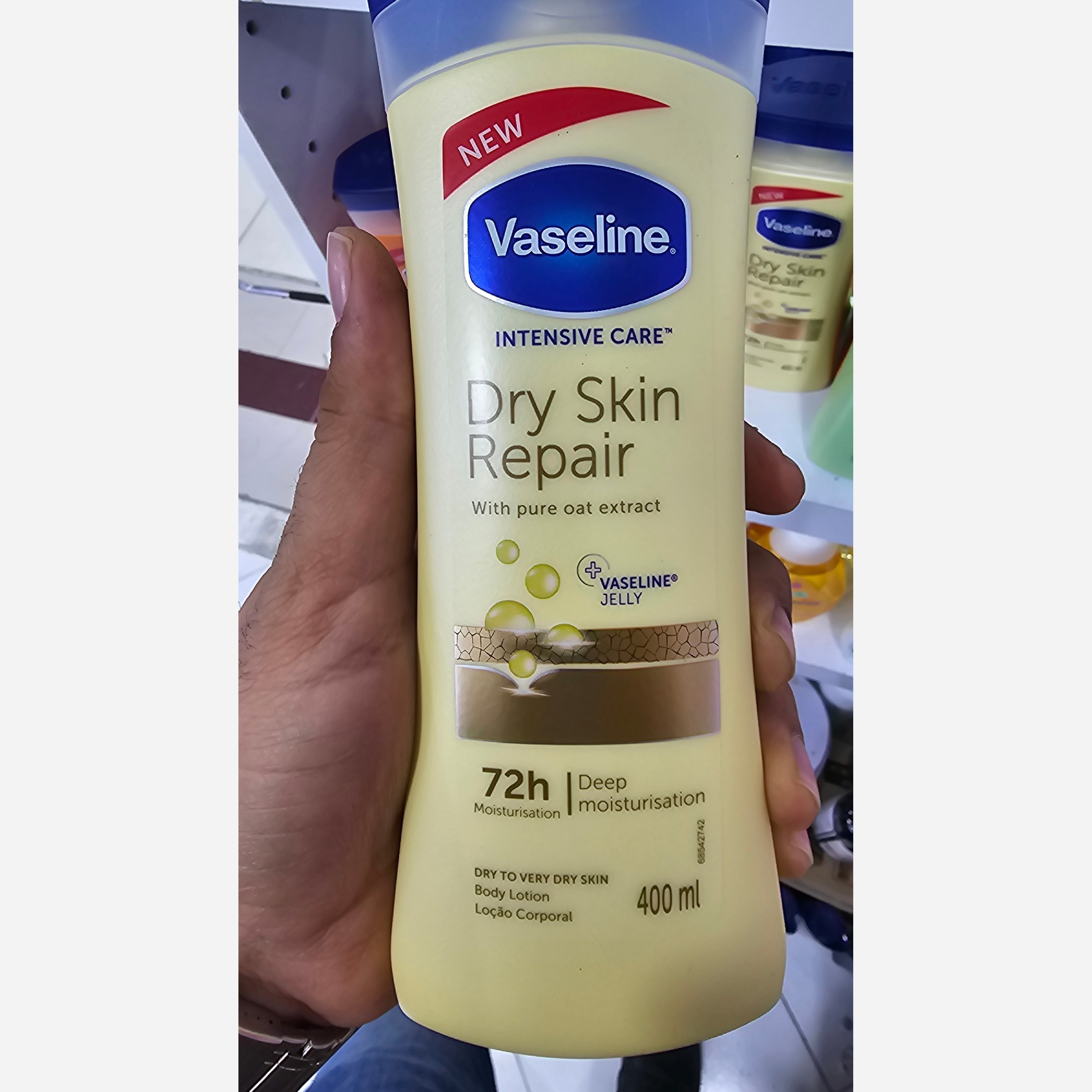 لوسیون وازلین جو دوسر مدل Dry Skin Repair آبرسان و ترمیم کننده پوست خشک حجم 400 میلیلیتر اورجینال